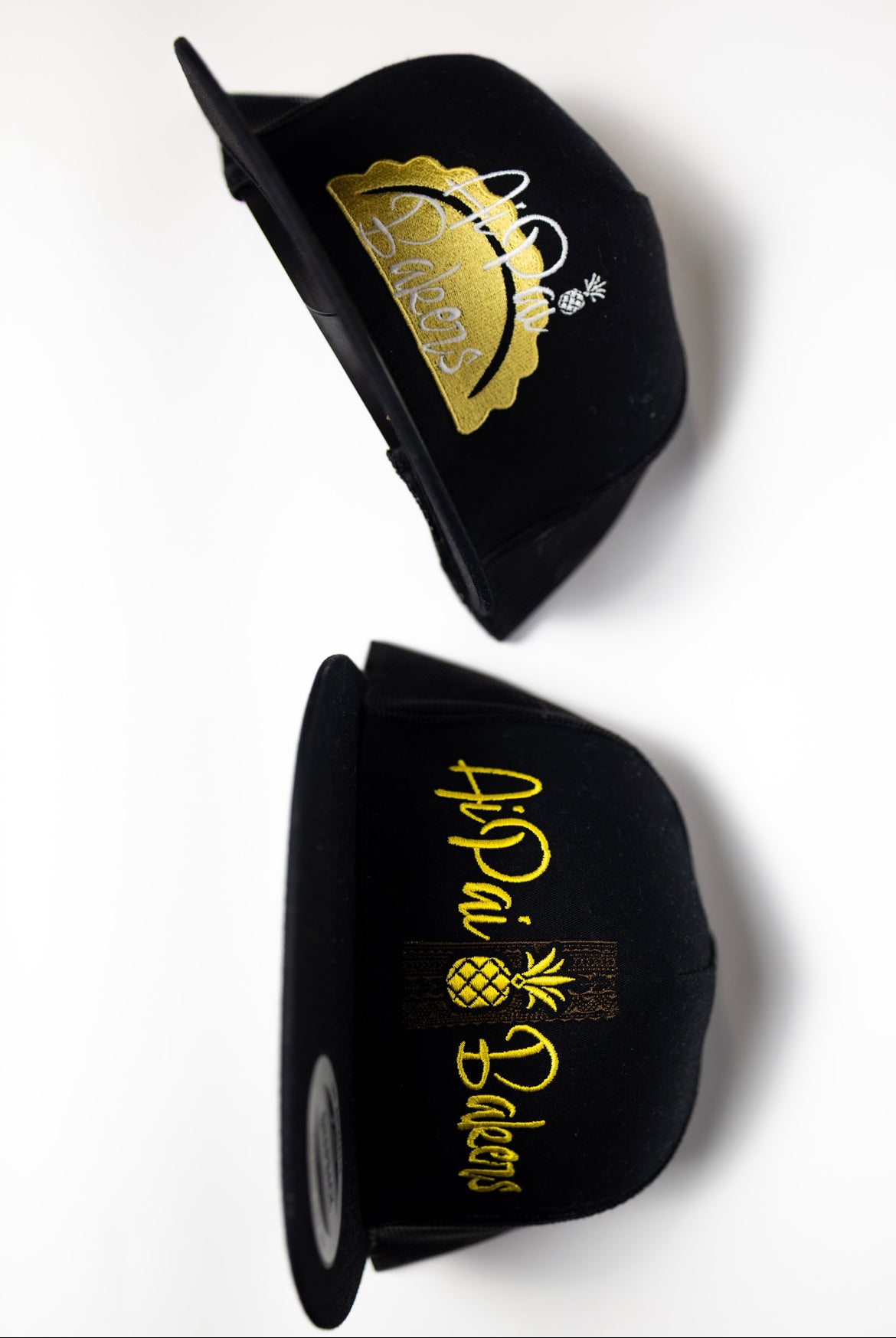 Black mesh snapback brown tribal/ gold letter stitching