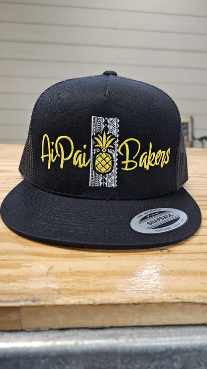 Black mesh snapback brown tribal/ gold letter stitching